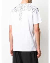 weißes und schwarzes bedrucktes T-Shirt mit einem Rundhalsausschnitt von Marcelo Burlon County of Milan