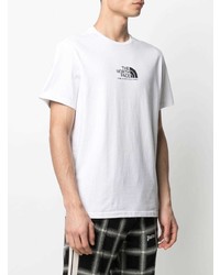 weißes und schwarzes bedrucktes T-Shirt mit einem Rundhalsausschnitt von The North Face