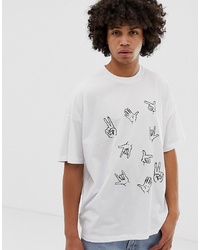 weißes und schwarzes besticktes T-Shirt mit einem Rundhalsausschnitt von ASOS DESIGN