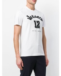 weißes und schwarzes besticktes T-Shirt mit einem Rundhalsausschnitt von Versace