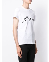 weißes und schwarzes besticktes T-Shirt mit einem Rundhalsausschnitt von Balmain