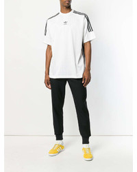 weißes und schwarzes horizontal gestreiftes T-Shirt mit einem Rundhalsausschnitt von adidas