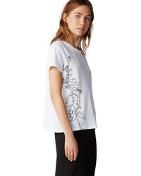 weißes und schwarzes T-Shirt mit einem Rundhalsausschnitt mit Blumenmuster von Marc O'Polo